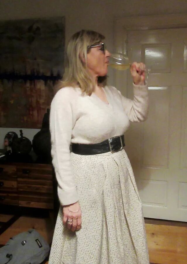 Her petticoat pressed her breasts forward