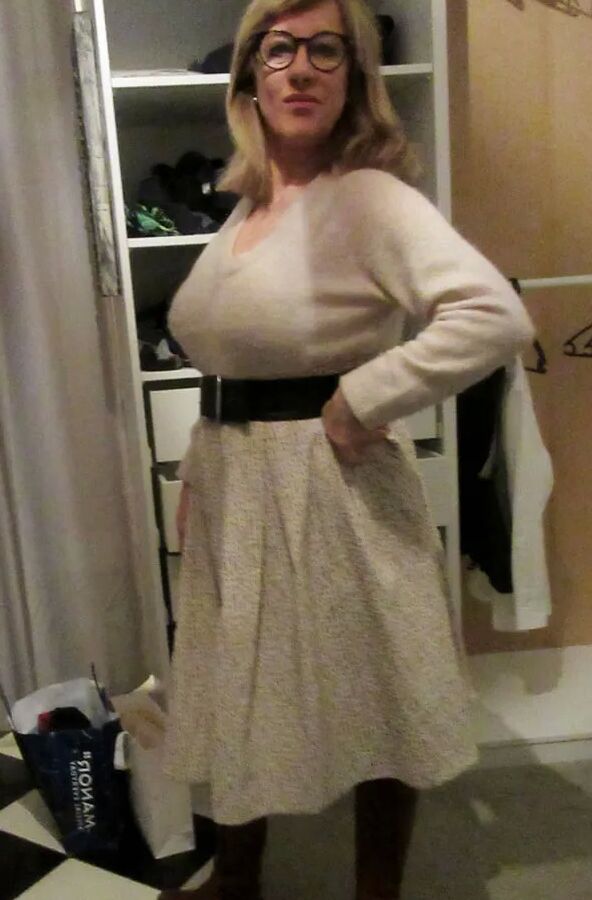 Her petticoat pressed her breasts forward