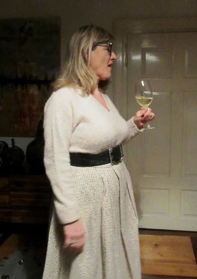 Her petticoat pressed her breasts forward