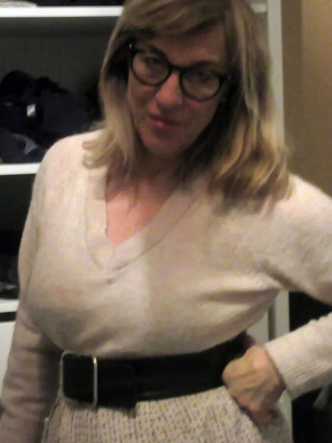 Her petticoat pressed her breasts forward