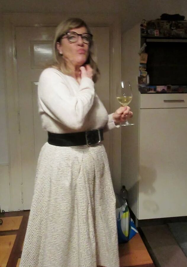 Her petticoat pressed her breasts forward