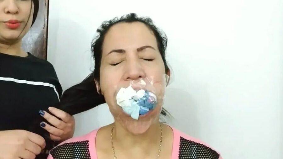 Gagged Woman Mouth Stuffed With Multiple Socks - Selfgags