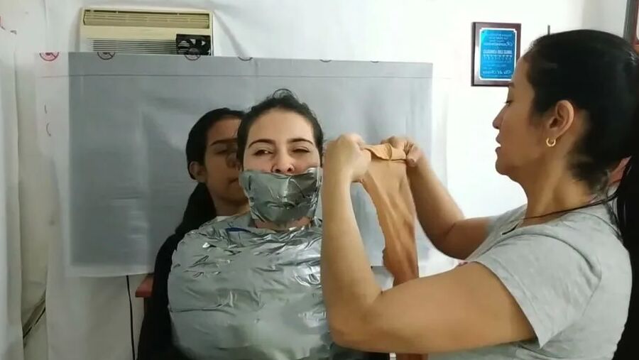 Sexy Girl Trapped In Ultra Tight Layered Mummification