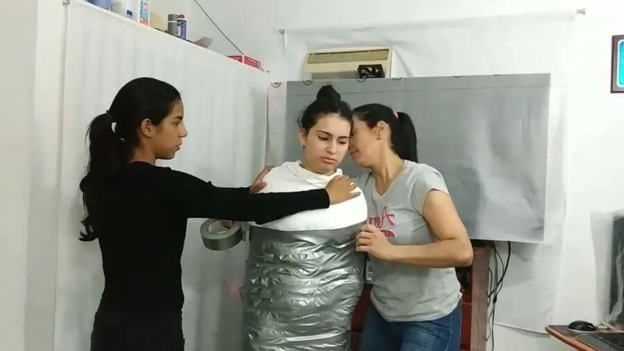 Sexy Girl Trapped In Ultra Tight Layered Mummification