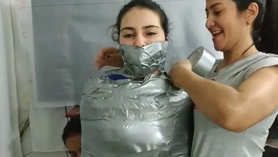 Sexy Girl Trapped In Ultra Tight Layered Mummification