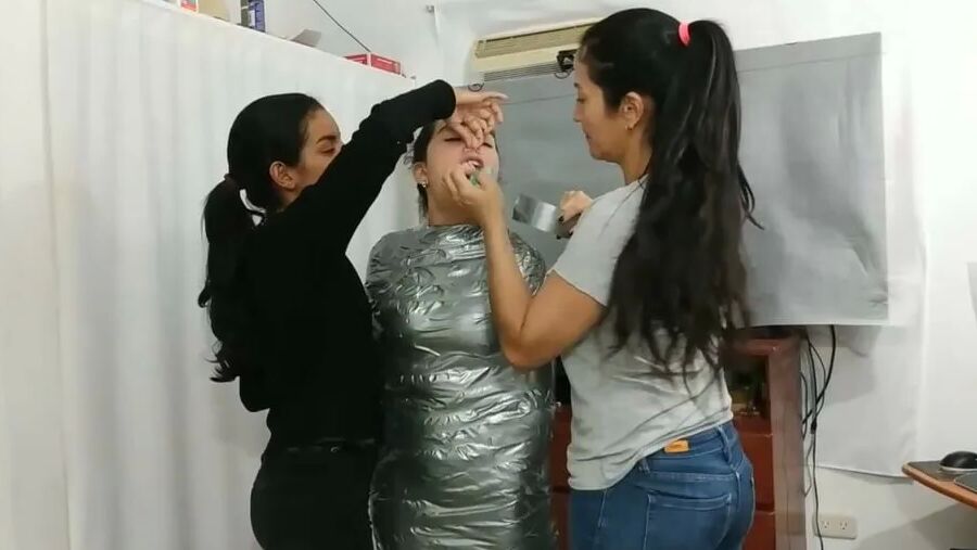 Sexy Girl Trapped In Ultra Tight Layered Mummification