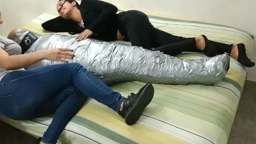 Sexy Girl Trapped In Ultra Tight Layered Mummification