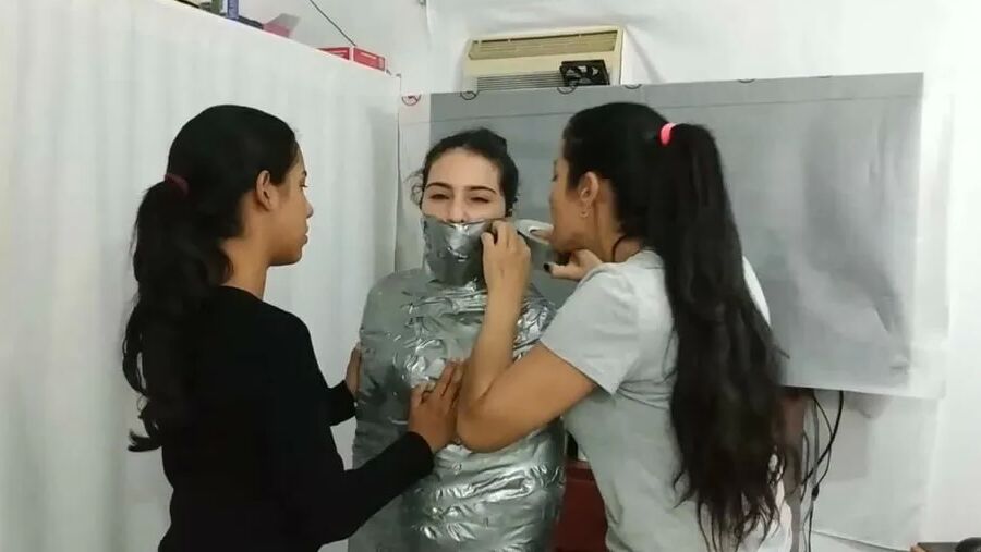 Sexy Girl Trapped In Ultra Tight Layered Mummification