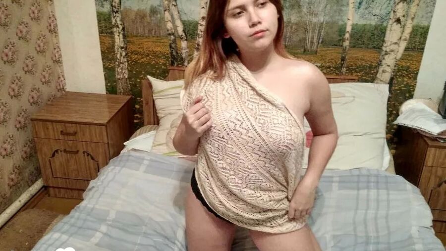 Smoking beauty strips off her clothes and masturbates