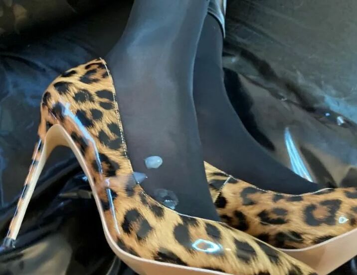 Black Leggings and Animal Print High Heels