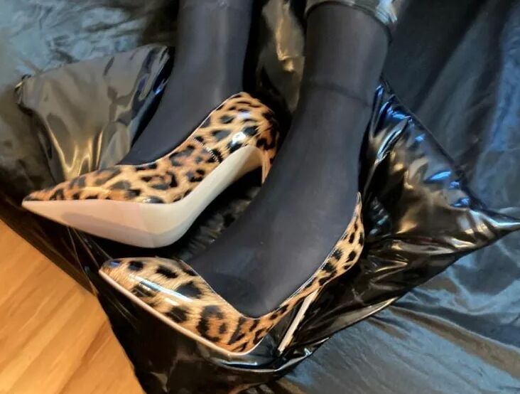 Black Leggings and Animal Print High Heels