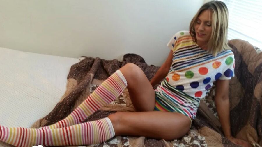 Babe with cute socks shows her dildo skills