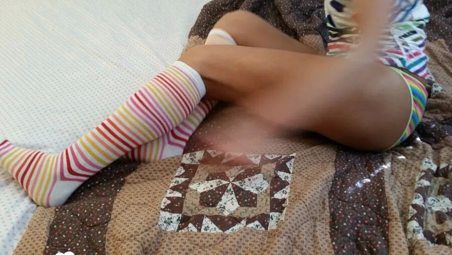 Babe with cute socks shows her dildo skills