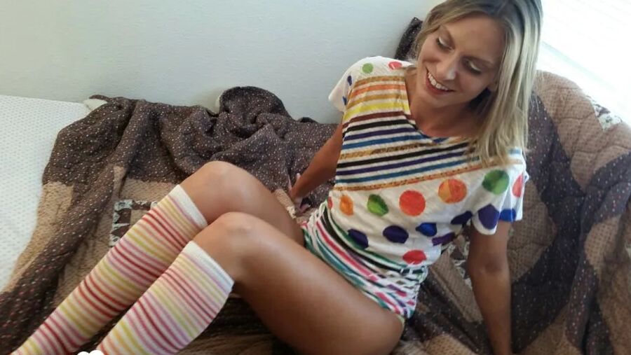 Babe with cute socks shows her dildo skills