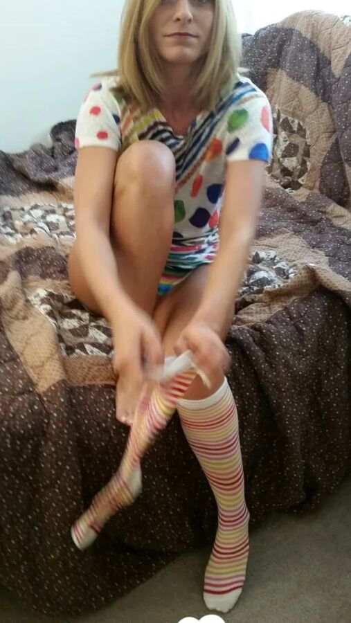 Babe with cute socks shows her dildo skills
