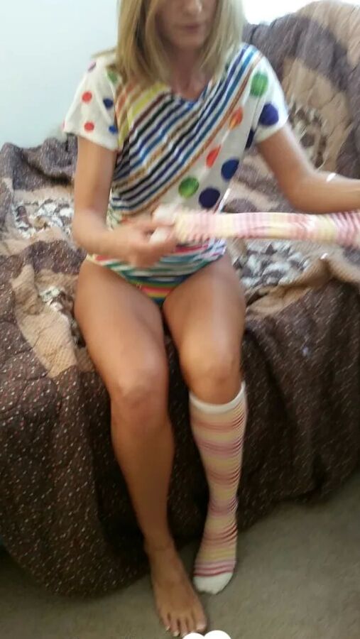 Babe with cute socks shows her dildo skills