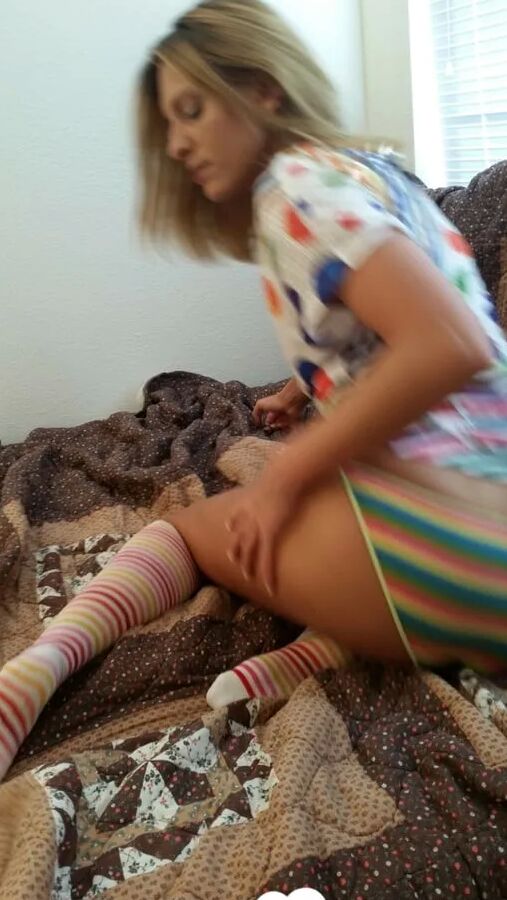 Babe with cute socks shows her dildo skills