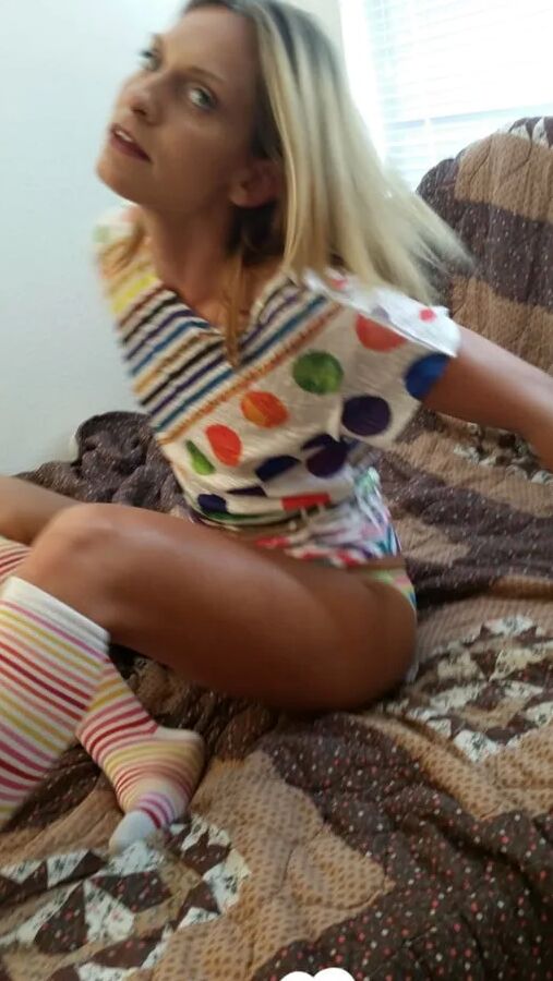 Babe with cute socks shows her dildo skills