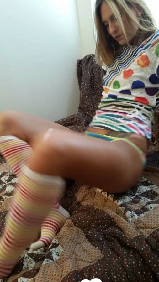 Babe with cute socks shows her dildo skills