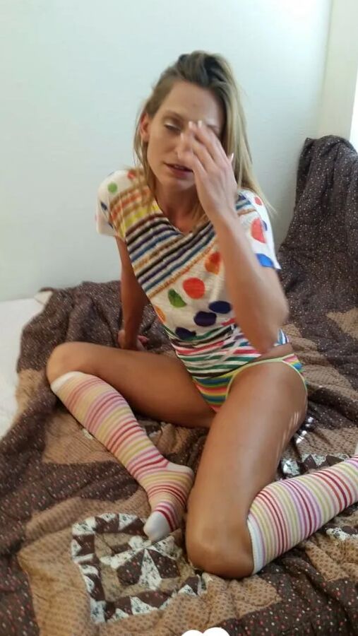 Babe with cute socks shows her dildo skills