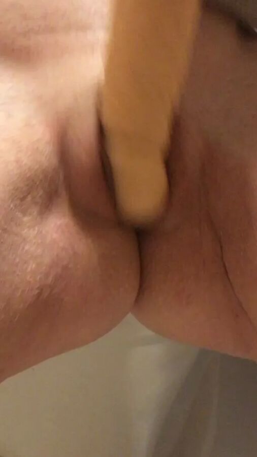 Playing with a dildo a little