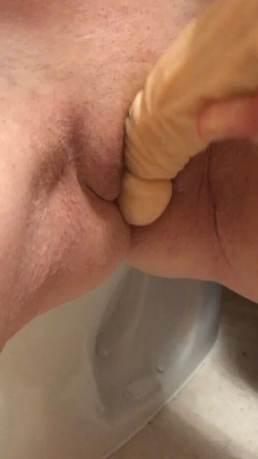 Playing with a dildo a little