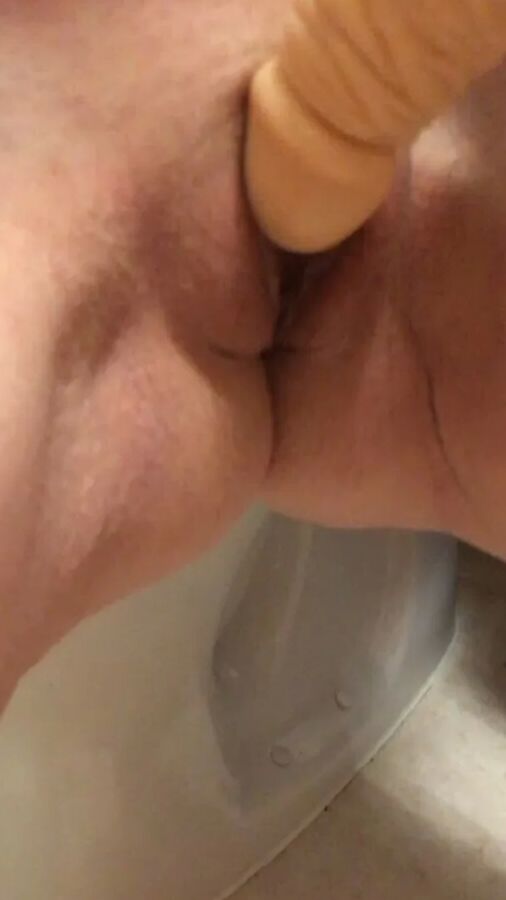 Playing with a dildo a little