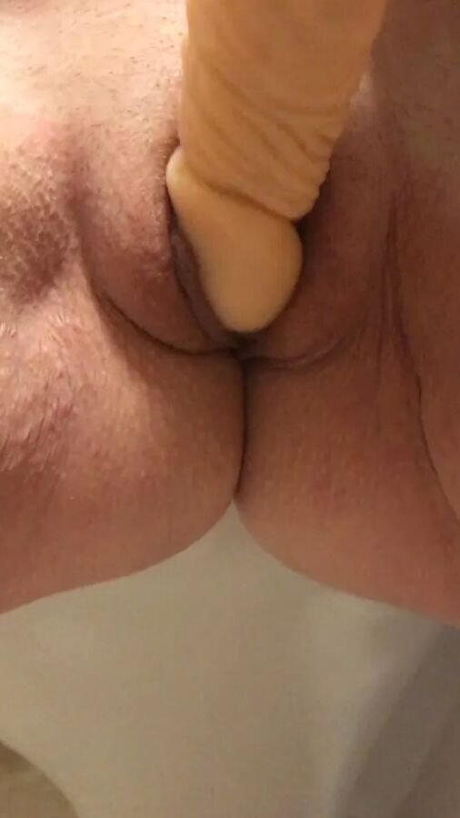 Playing with a dildo a little
