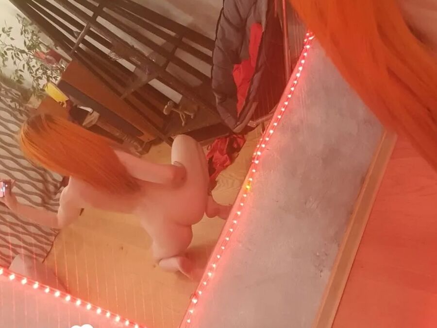 Extraordinary redhead knows how to do naughty poses