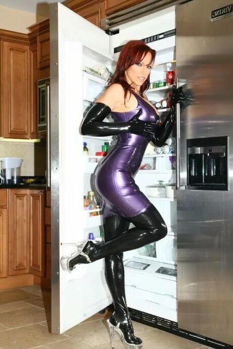Redhead Milf In Latex Getting Fucked