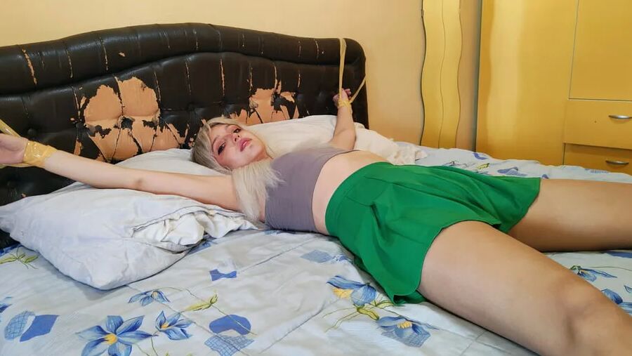Dana Tied Up To The Bed Wearing Pantyhose