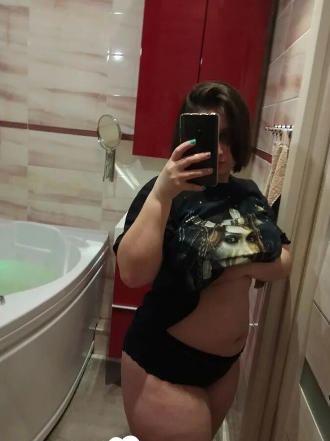 Chubby amateur teases with her big tits