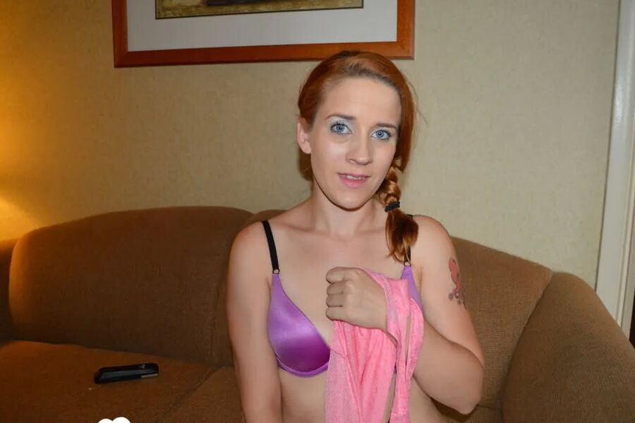 Ginger lady gently rubs her eager vagina