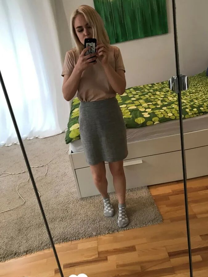 Lonely babe testing out her new mirror
