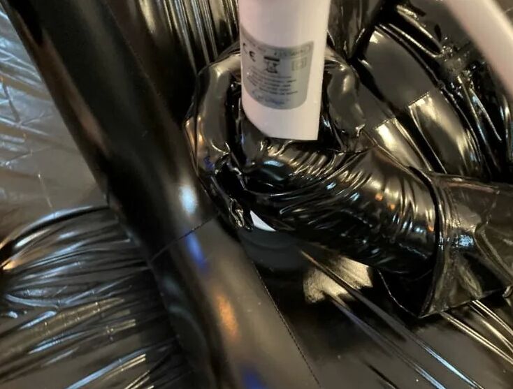 Black vinyl masturbation