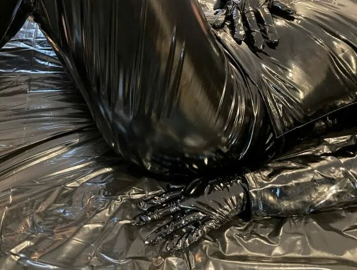Black vinyl masturbation