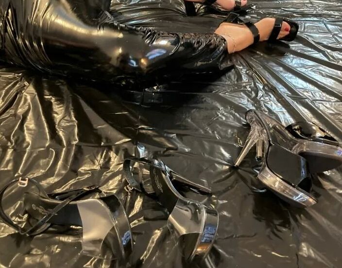 Black vinyl masturbation