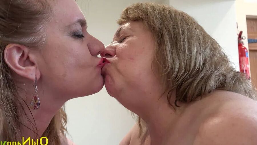 Two lesbians have sex on the table