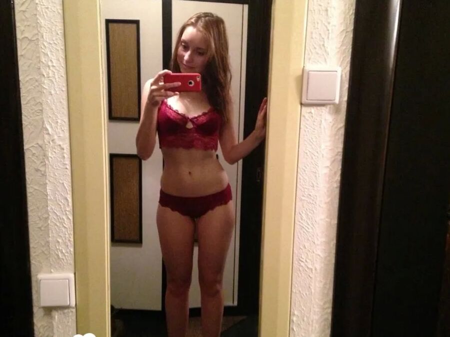Irresistible teen posing in some sexy outfits