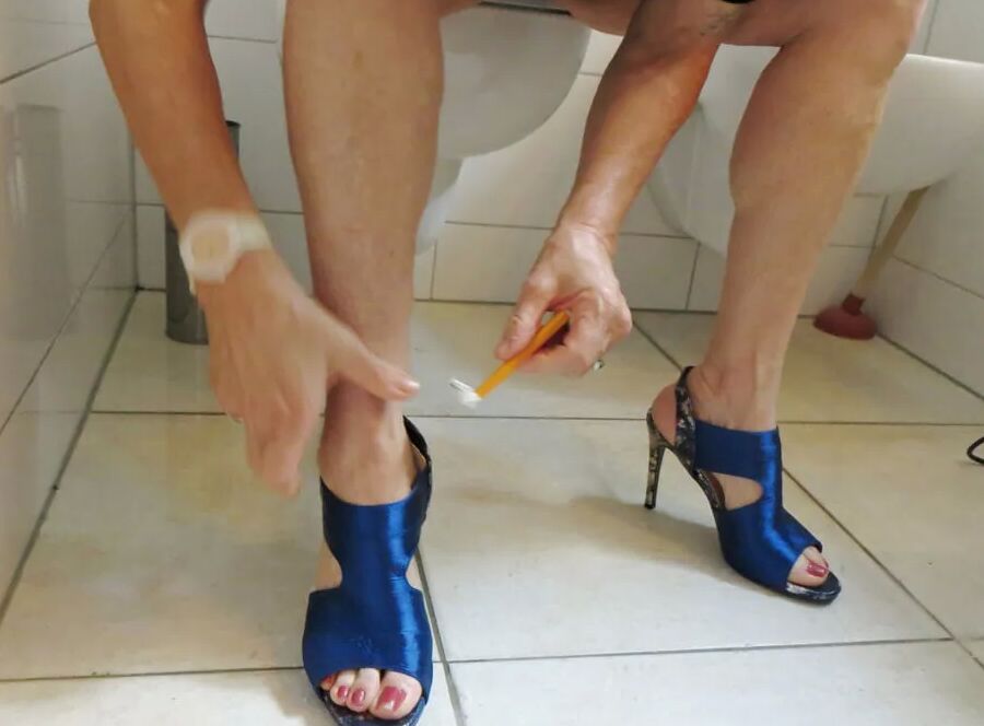 She dresses for the party - her blue slingbacks