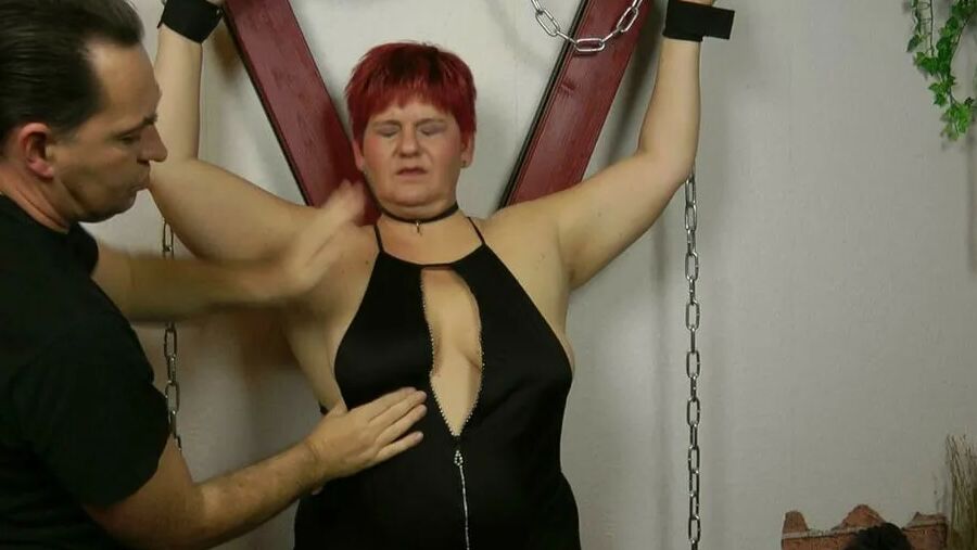 Tits spanking on the cross and bock