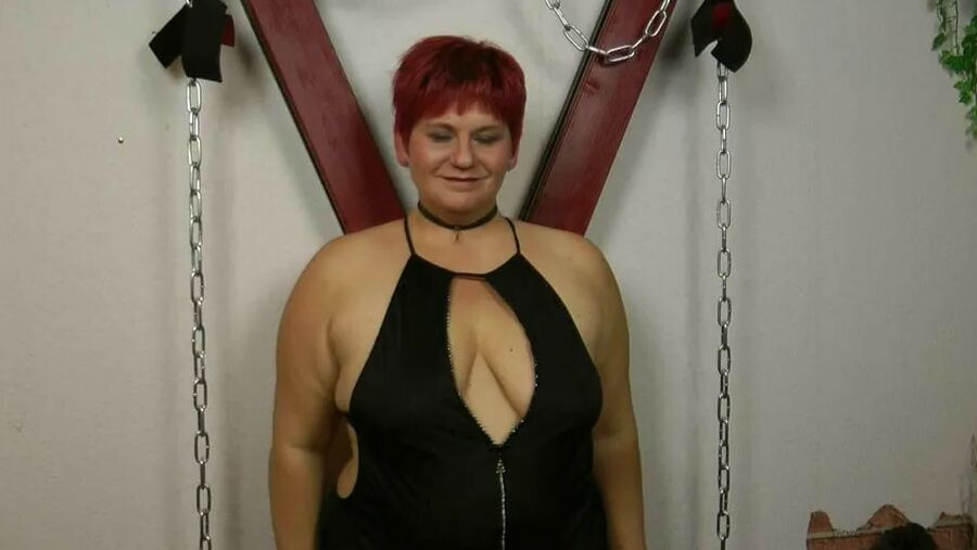Tits spanking on the cross and bock
