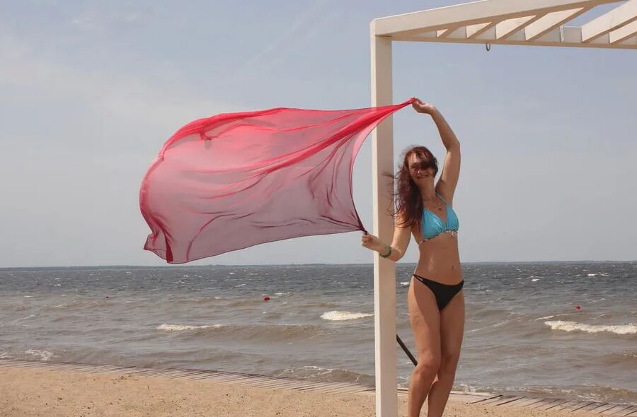 Red Shawl on windy weather