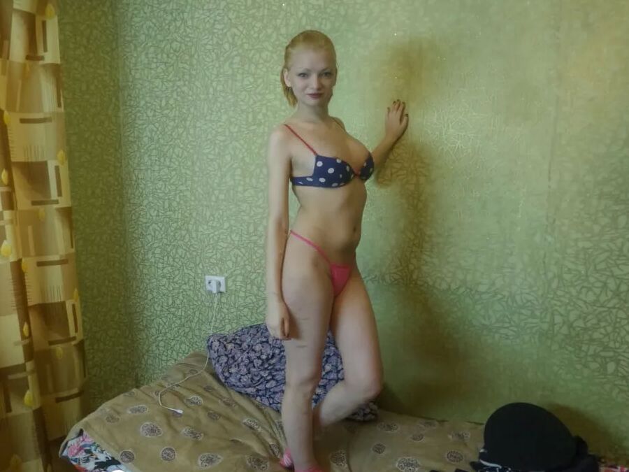 Girlfriend teases with a hot outfit before stripping
