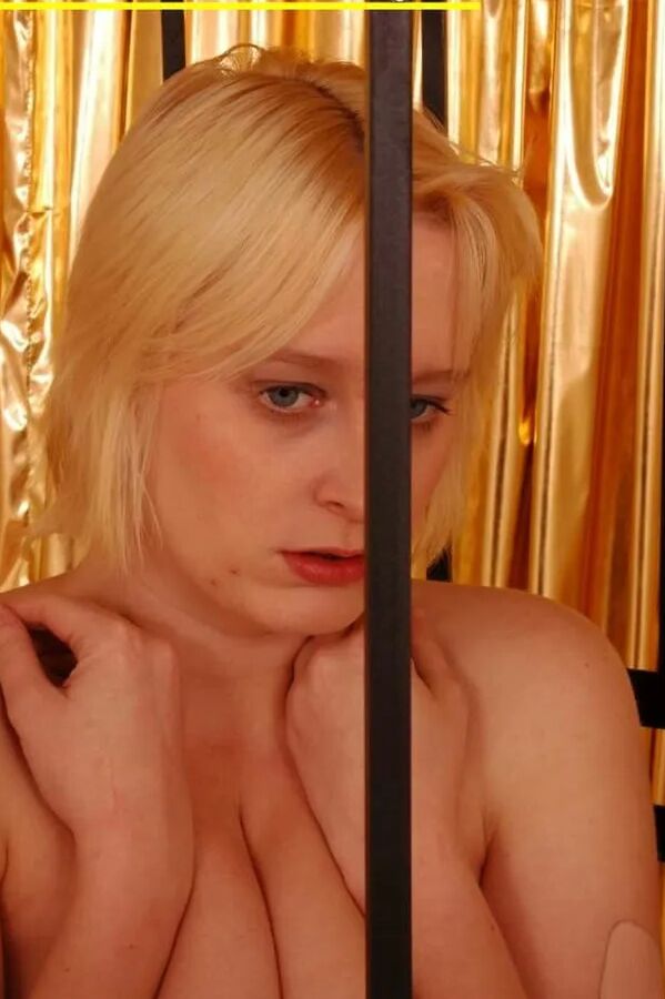 Blonde cum slut Dany Sun in a cage