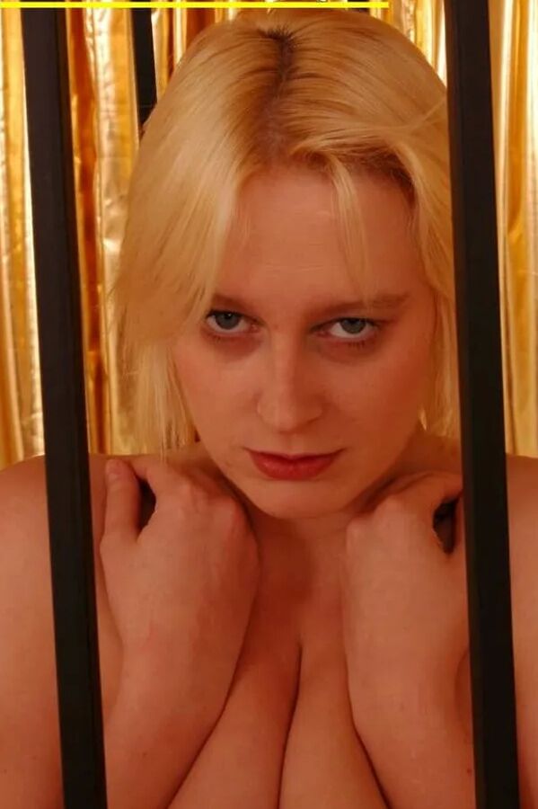 Blonde cum slut Dany Sun in a cage
