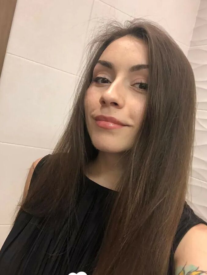 Gorgeous brunette with a tattoo loves to tease