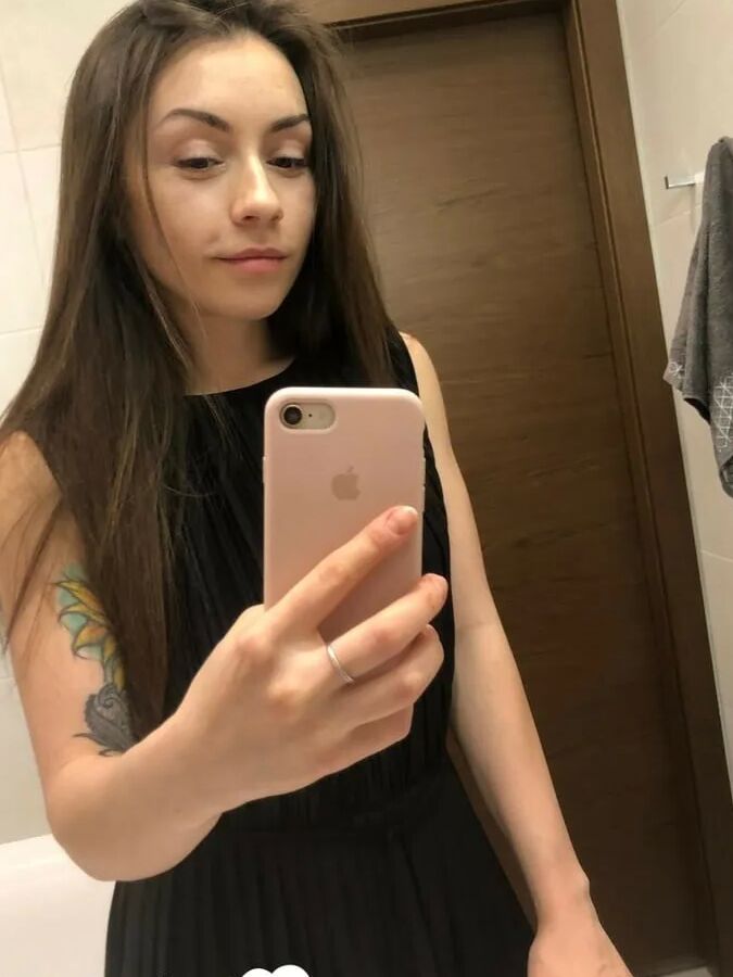 Gorgeous brunette with a tattoo loves to tease