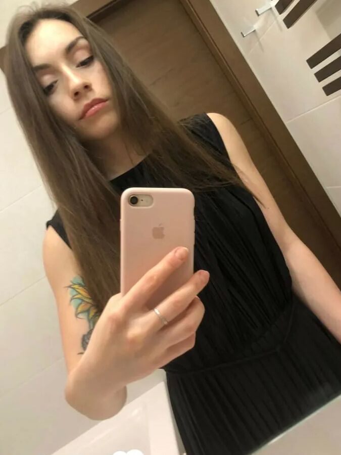 Gorgeous brunette with a tattoo loves to tease