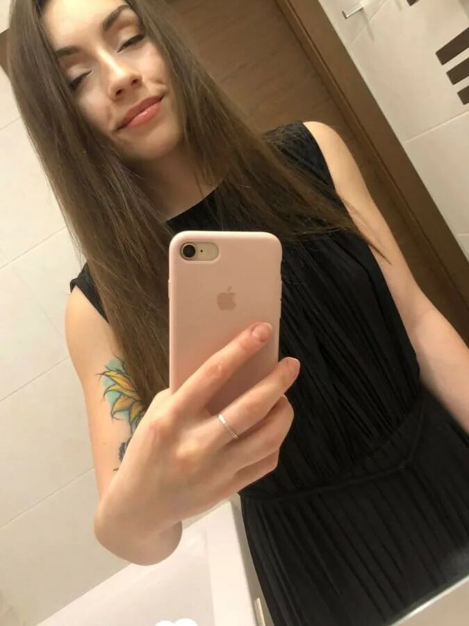 Gorgeous brunette with a tattoo loves to tease